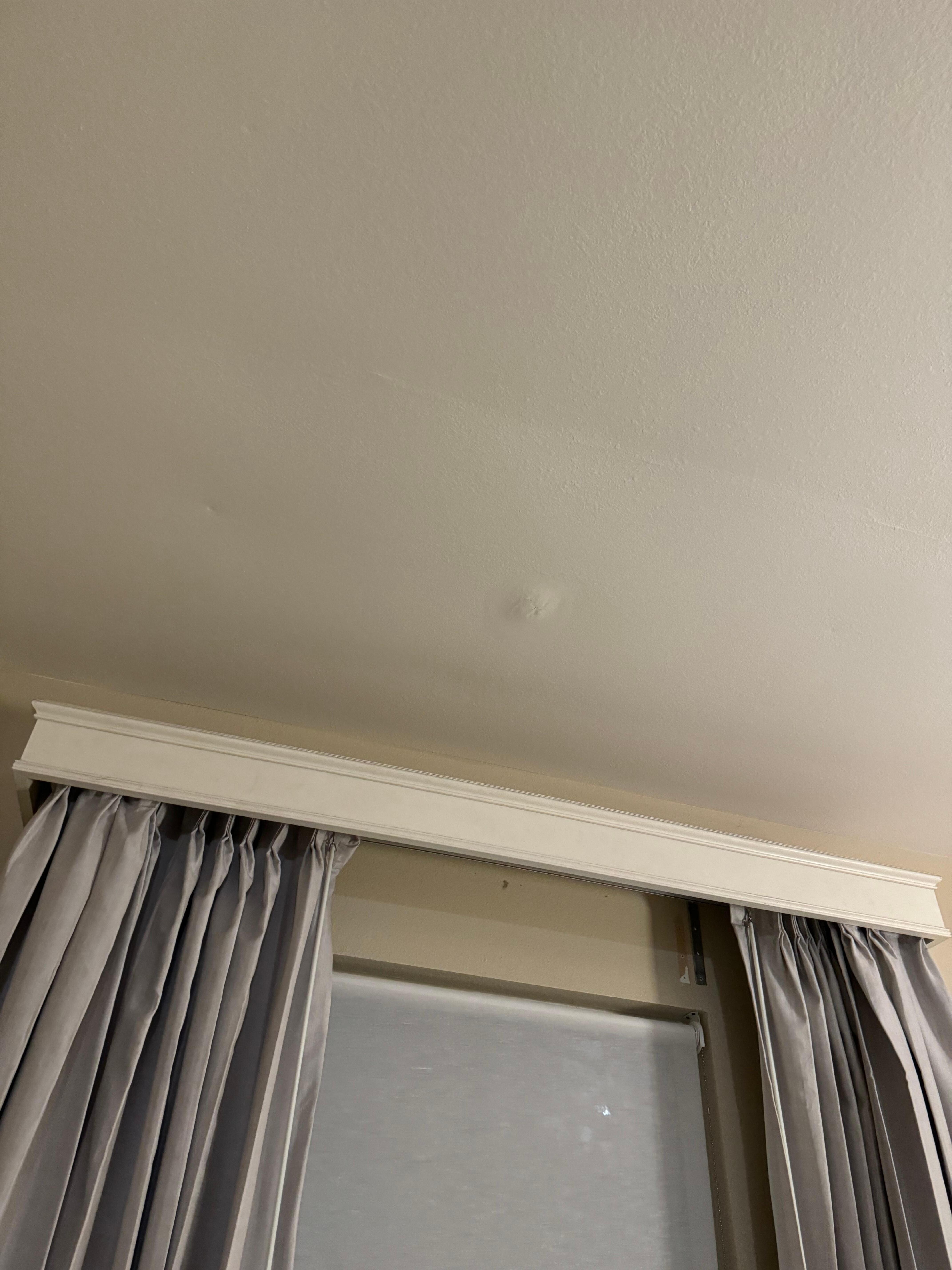Ceiling in new room. Looked like it had had a leak at some point.