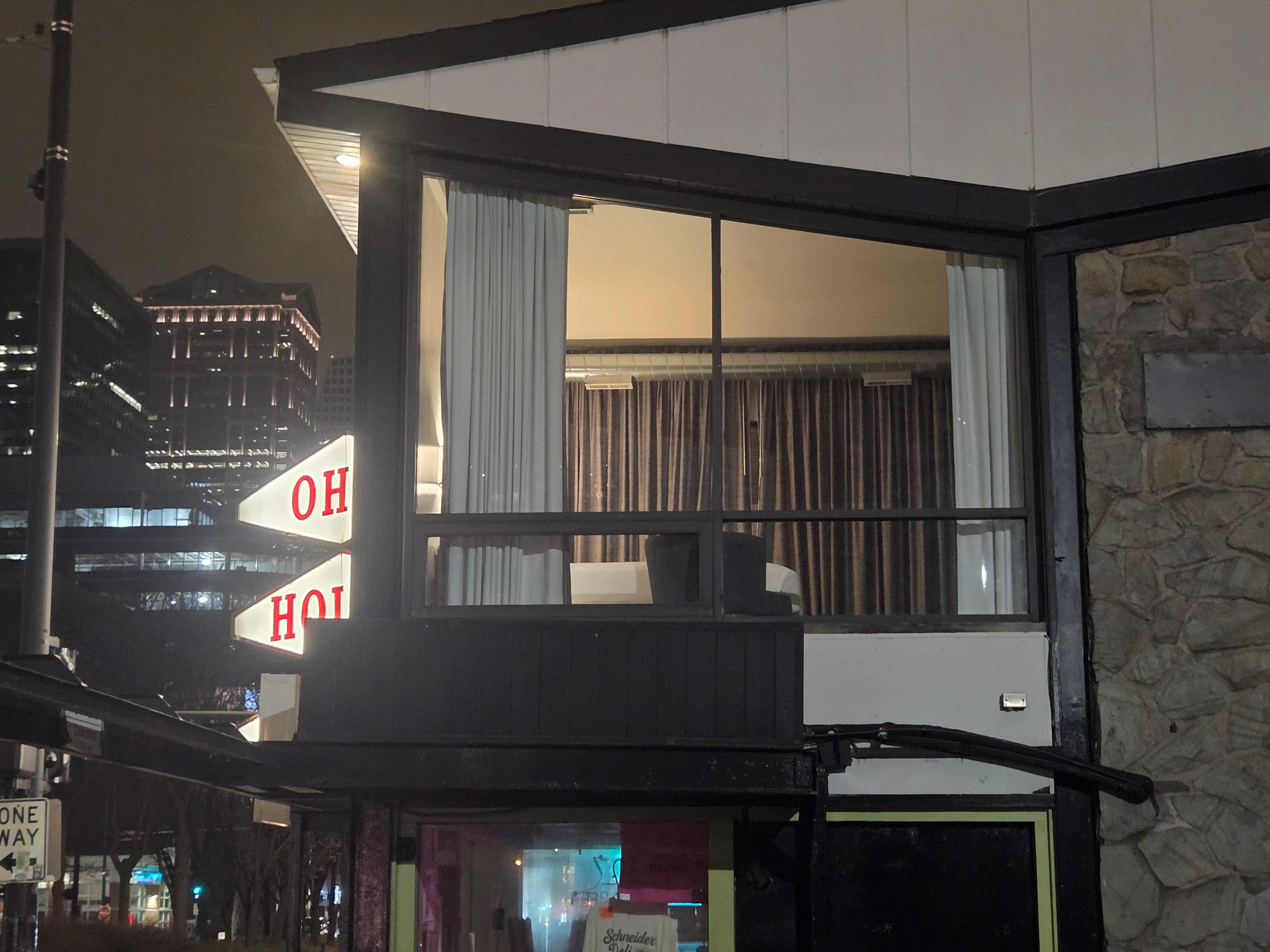 King Suite no balcony access attached. You must leave that building to cross their parking lot to stand in front of other rooms on the balcony