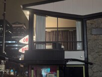 King Suite no balcony access attached. You must leave that building to cross their parking lot to stand in front of other rooms on the balcony