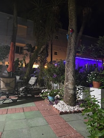 Common area with twinkly lights at night