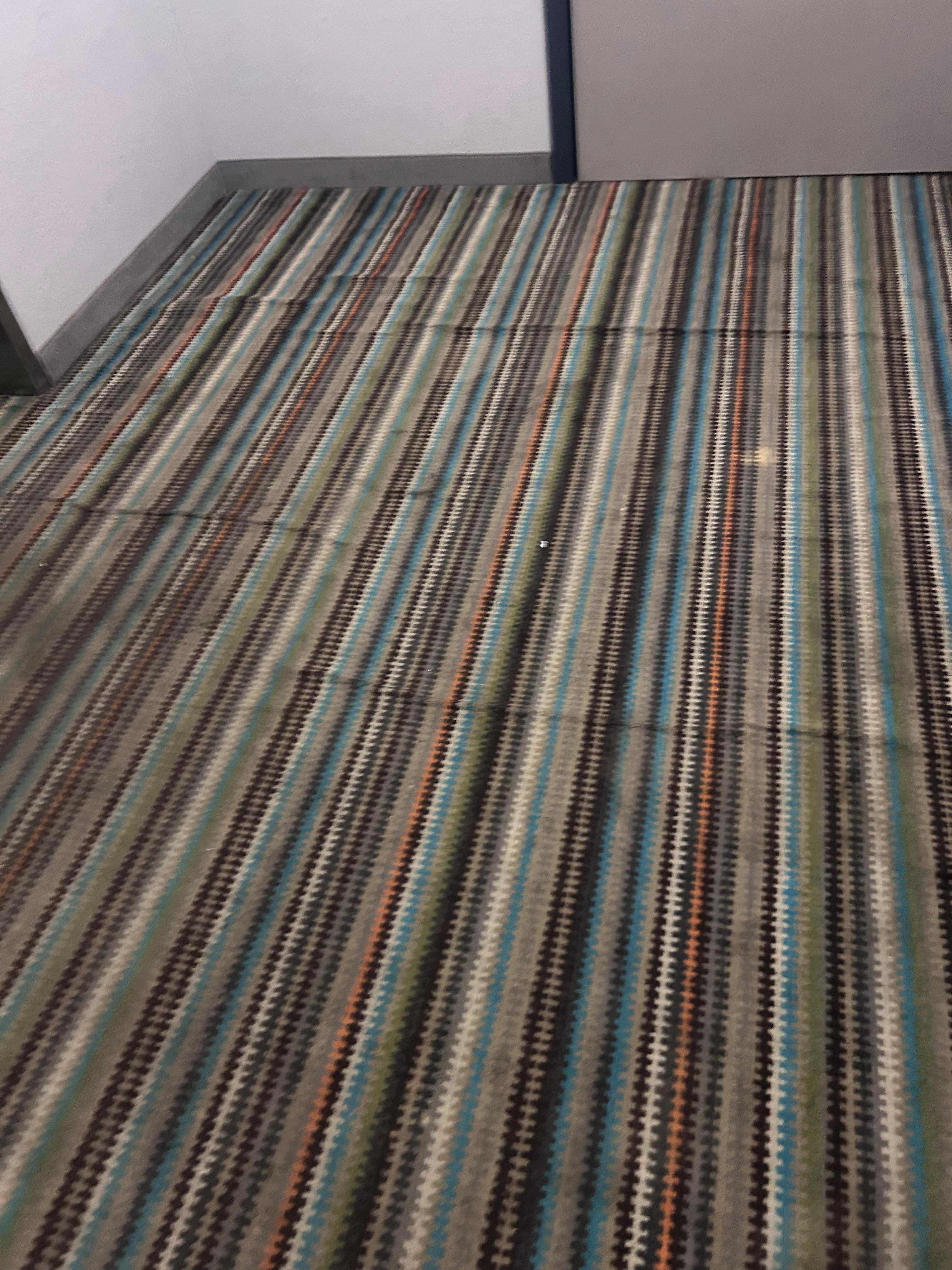 Worn, stained carpet 