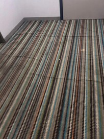 Worn, stained carpet