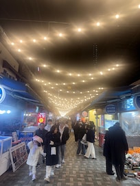 Food street just behind the hotel. Come out of hotel turn right and on main road turn right again keep walking you will see the first alley is full of street food.