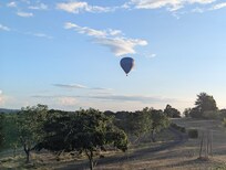 Balloons passing one evening