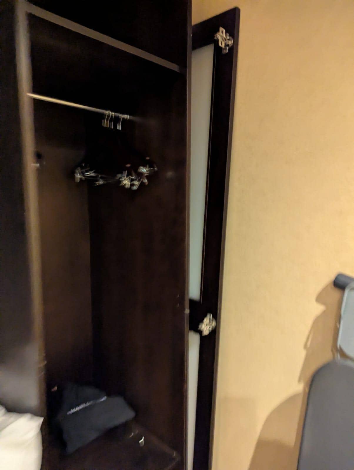 The wardrobe door was completely off and just resting against it when we arrived. We moved it to the side so it didn't fall on one of our children 