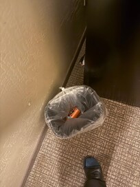 Trash found under nightstand, thrown away