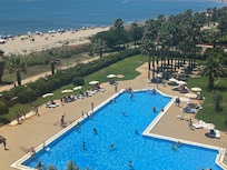 Pool with beds and chairs