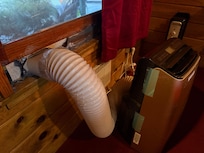 Air conditioning unit. Hose fell out once.