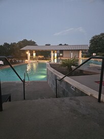 Adult infinity pool with swim up bar
