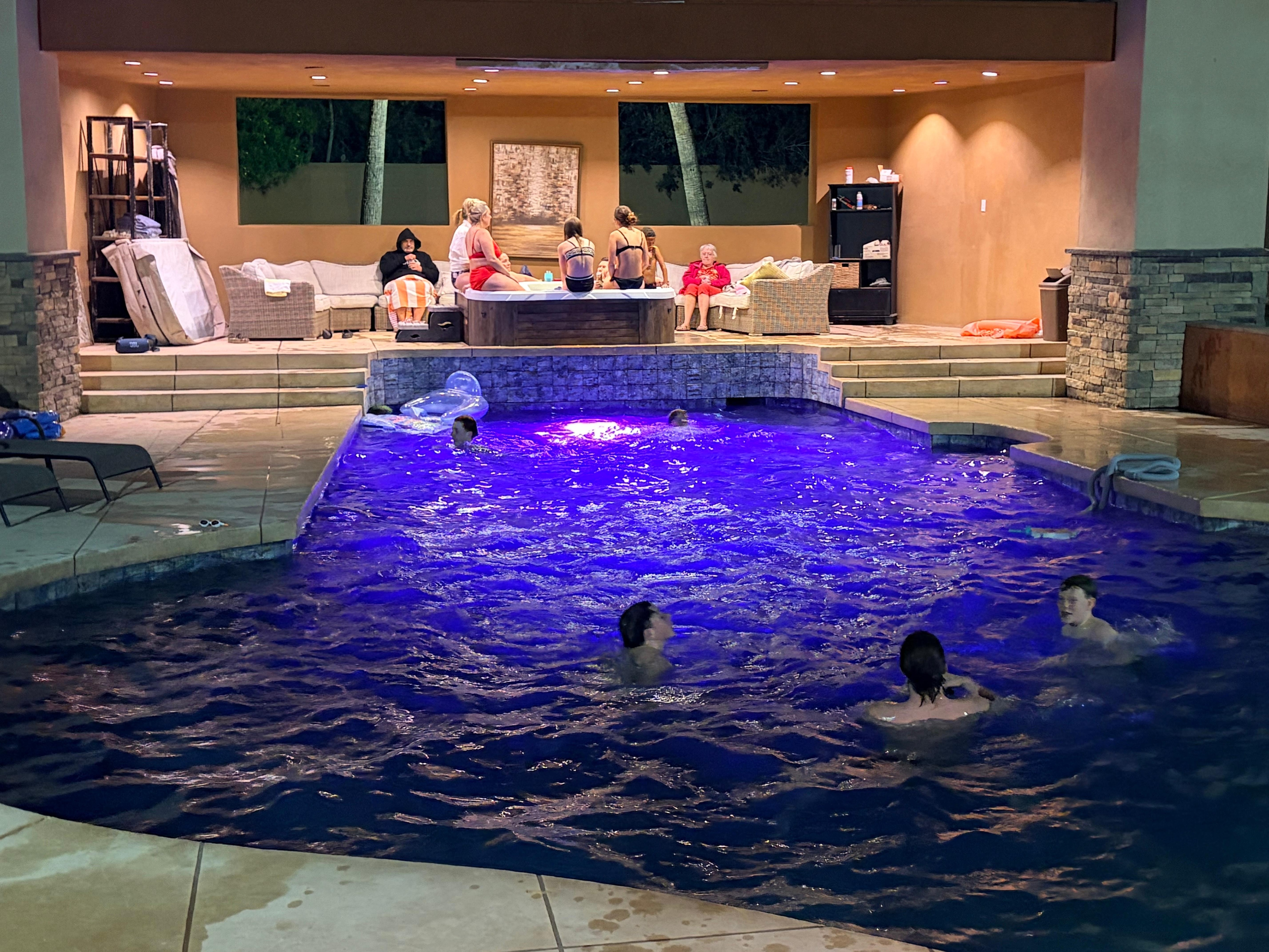 Kids enjoying pool in the evening. 