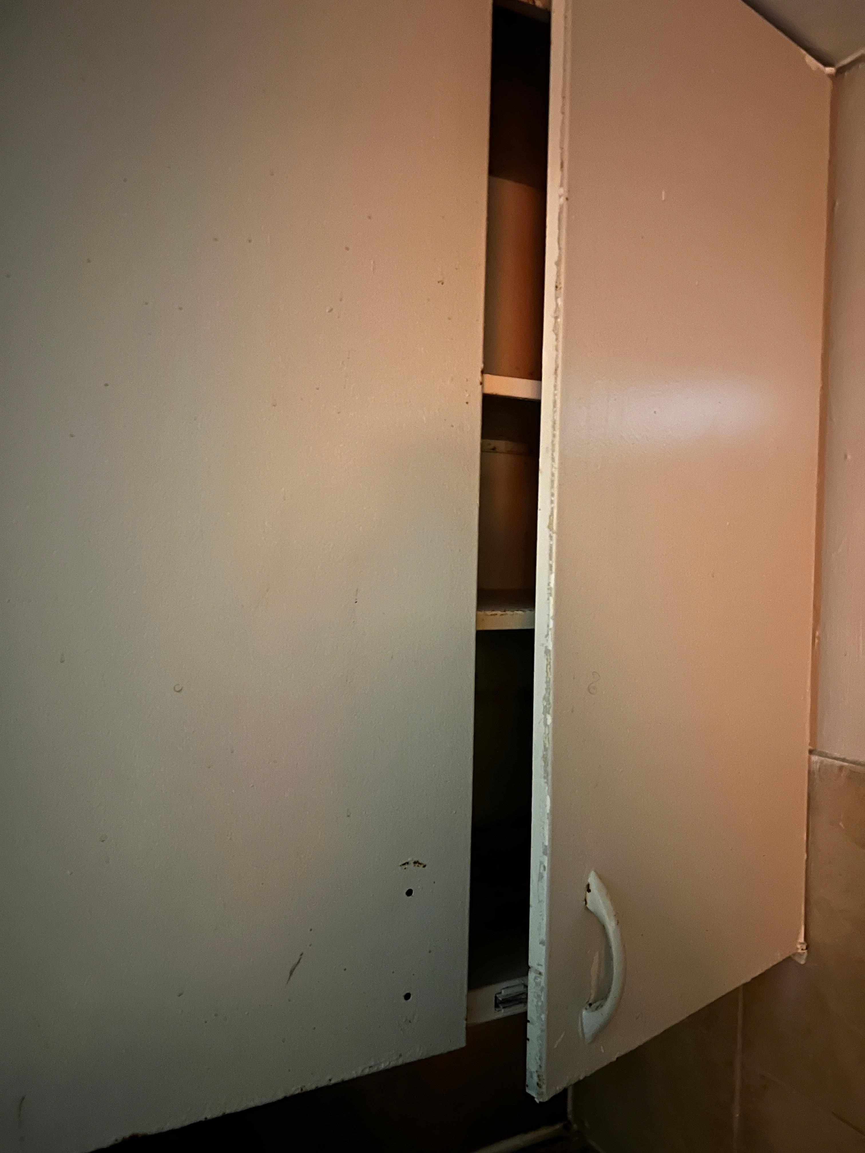 Kitchenette cabinet (and bathroom cabinet) wouldn’t close