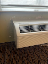 Chipped, peeling paint around the ac