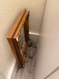 Broken picture and towel rod