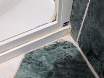 Photo that is typical of the bathroom shower area.