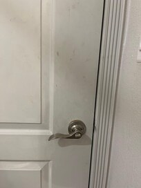 Grimy dirty prints on door