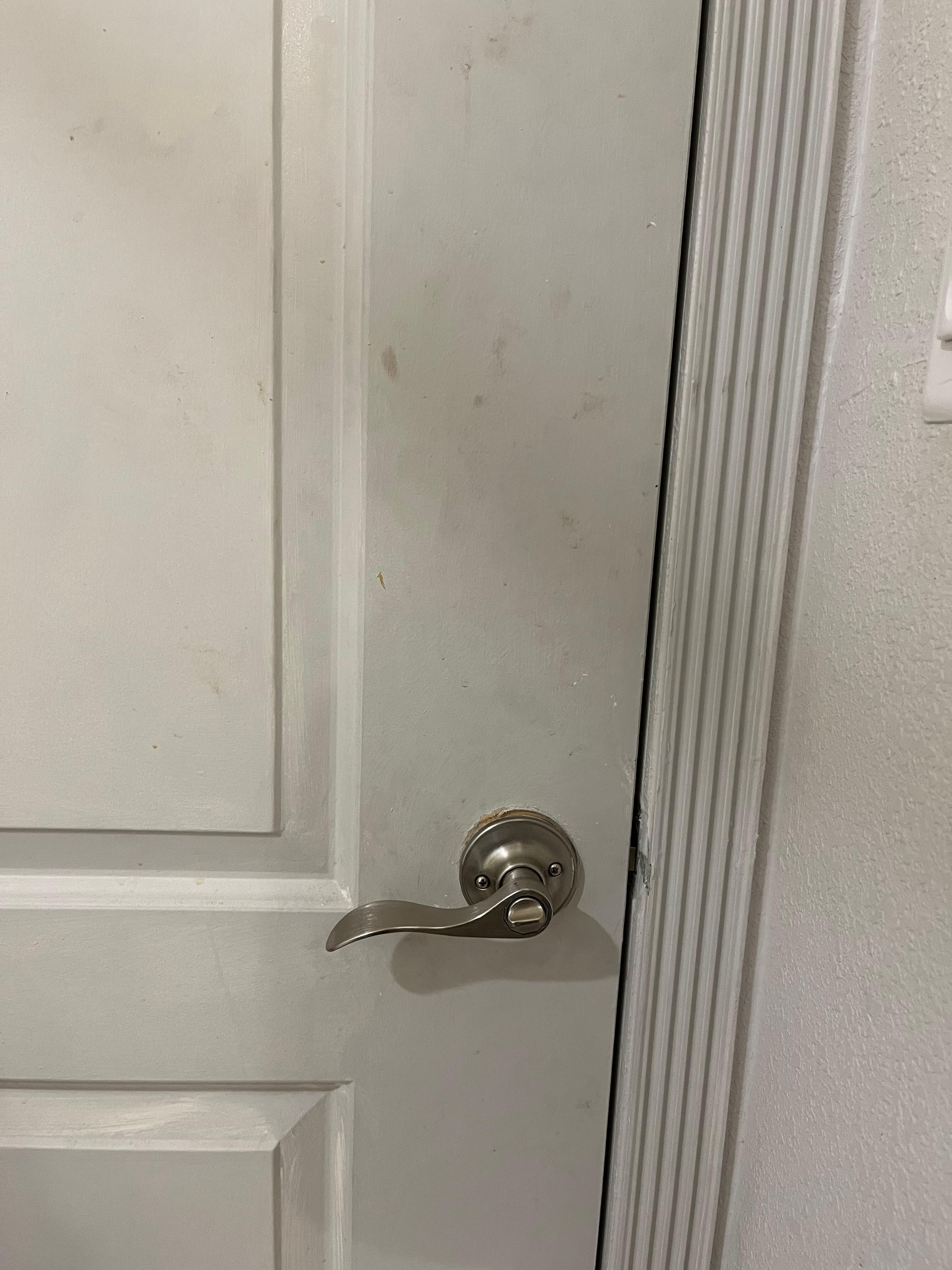 Grimy dirty prints on door