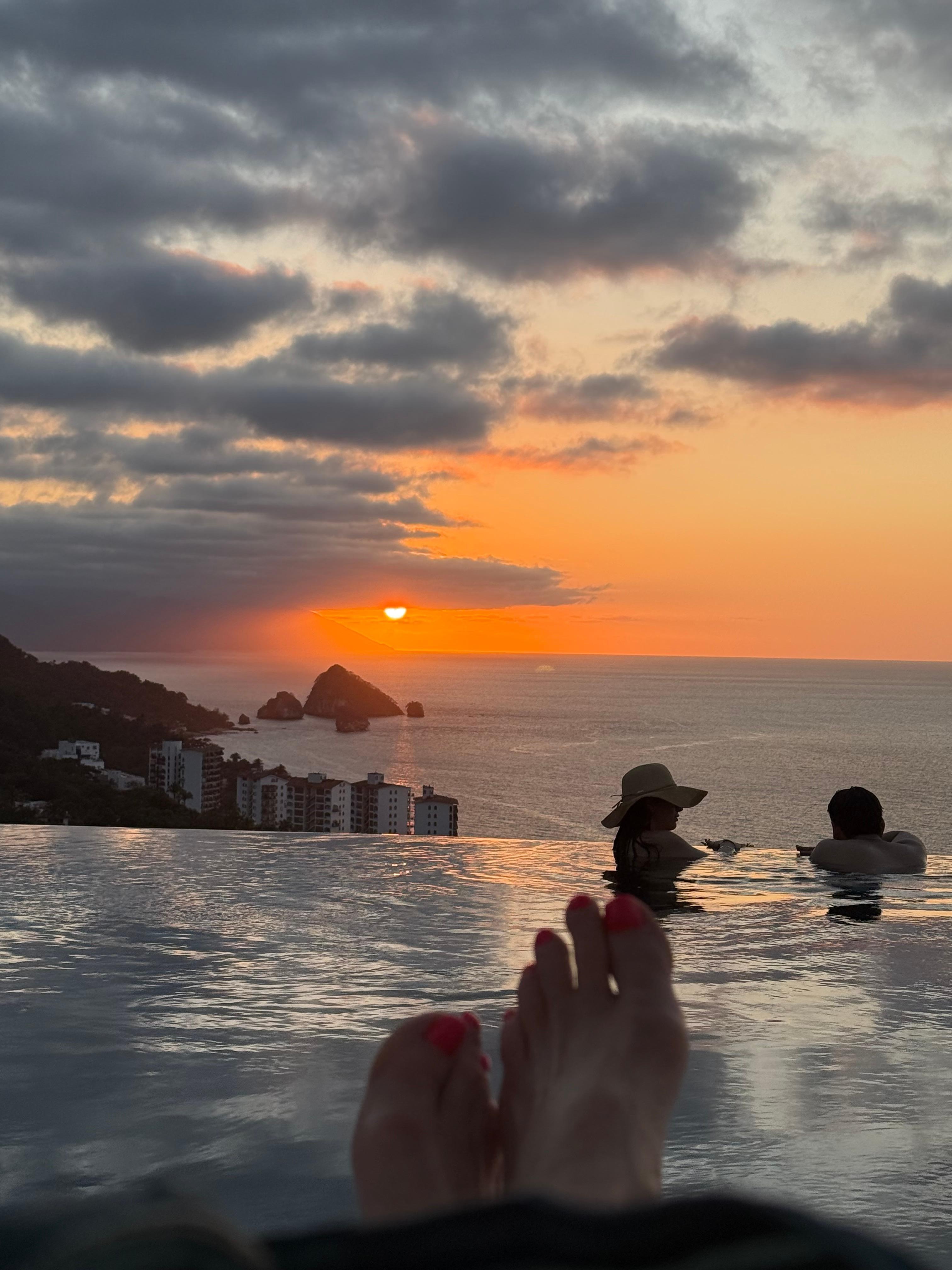 Roof top pool at sunset 