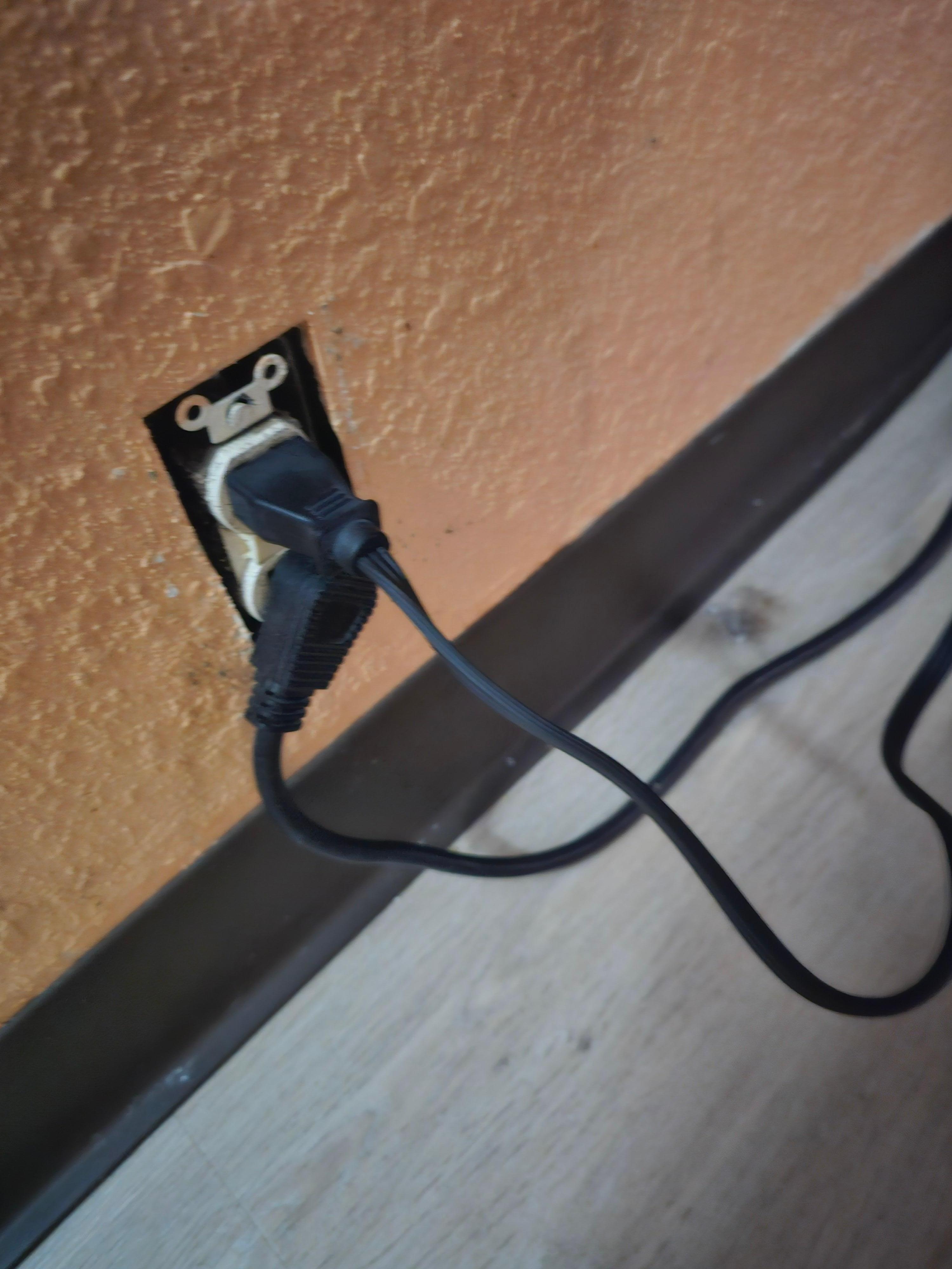 Under the desk- coffee pot & microwave plugs.