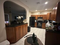 Beautiful kitchen which is well stocked.