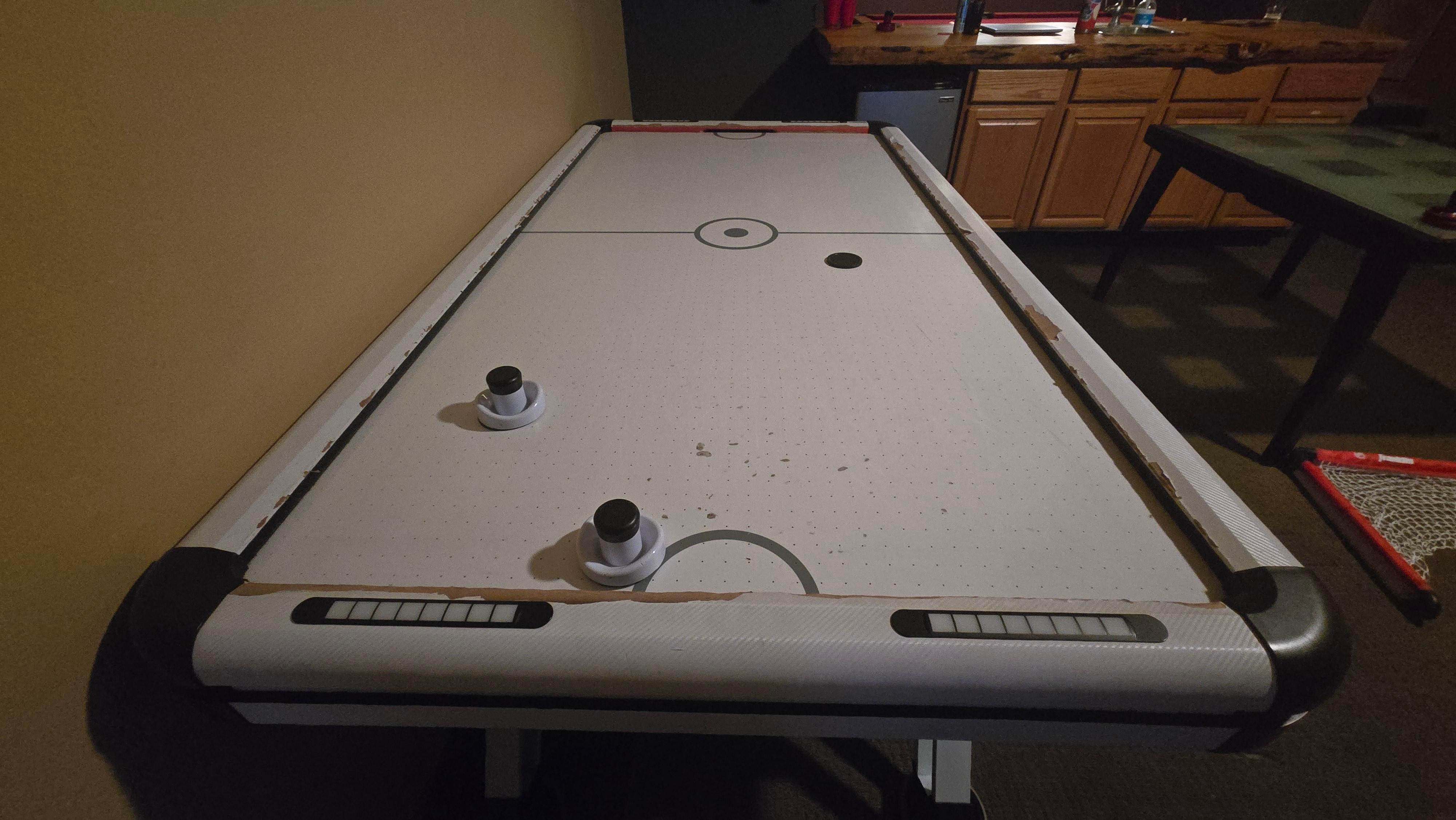 Air hockey table has seen better times