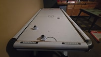Air hockey table has seen better times
