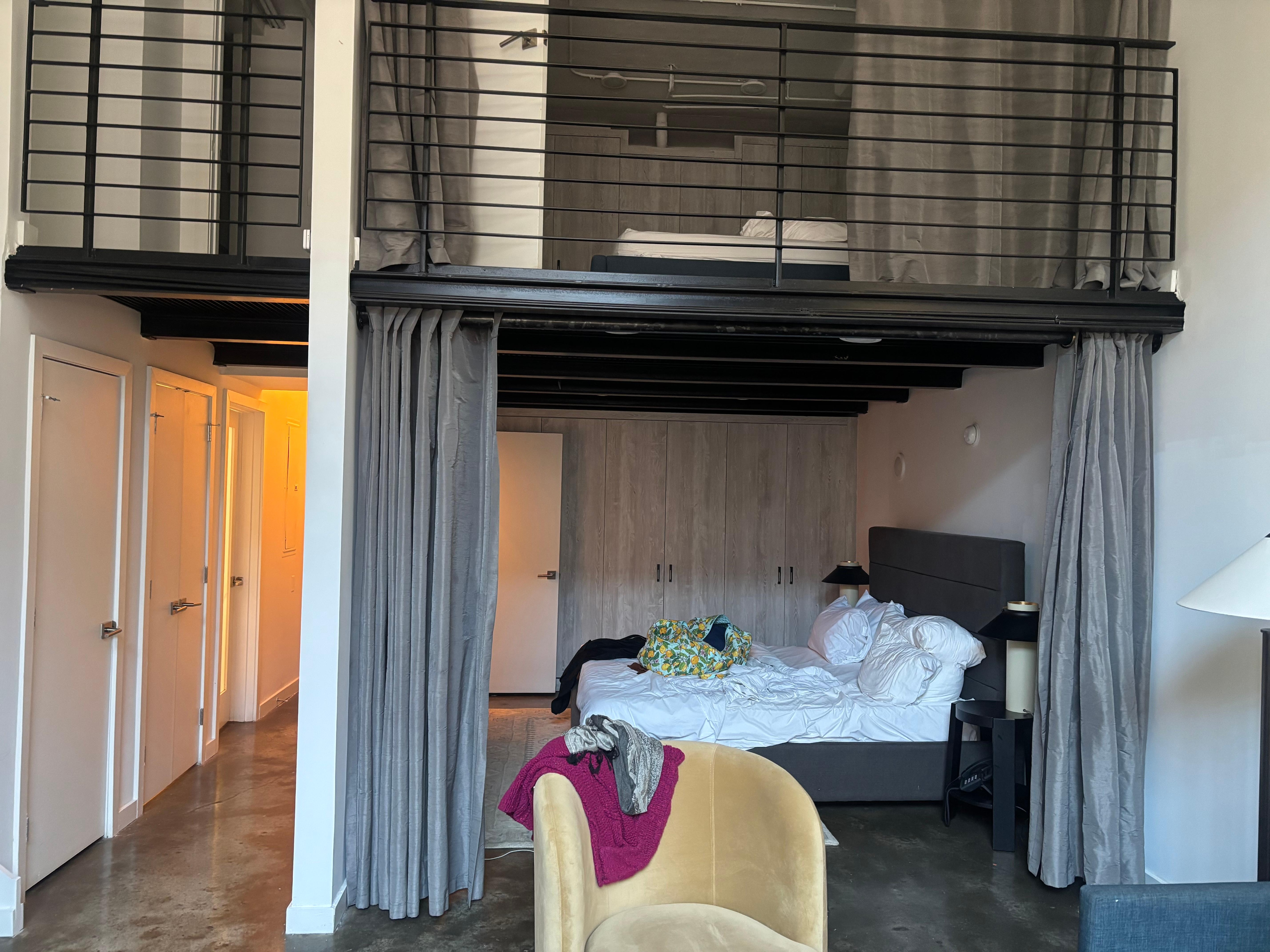 Looking into the downstairs bedroom, don’t mind the mess. It’s all ours.