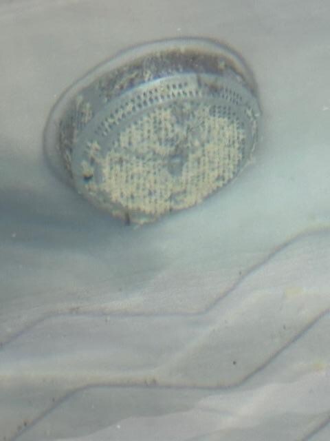 Scum on hot tub inlet