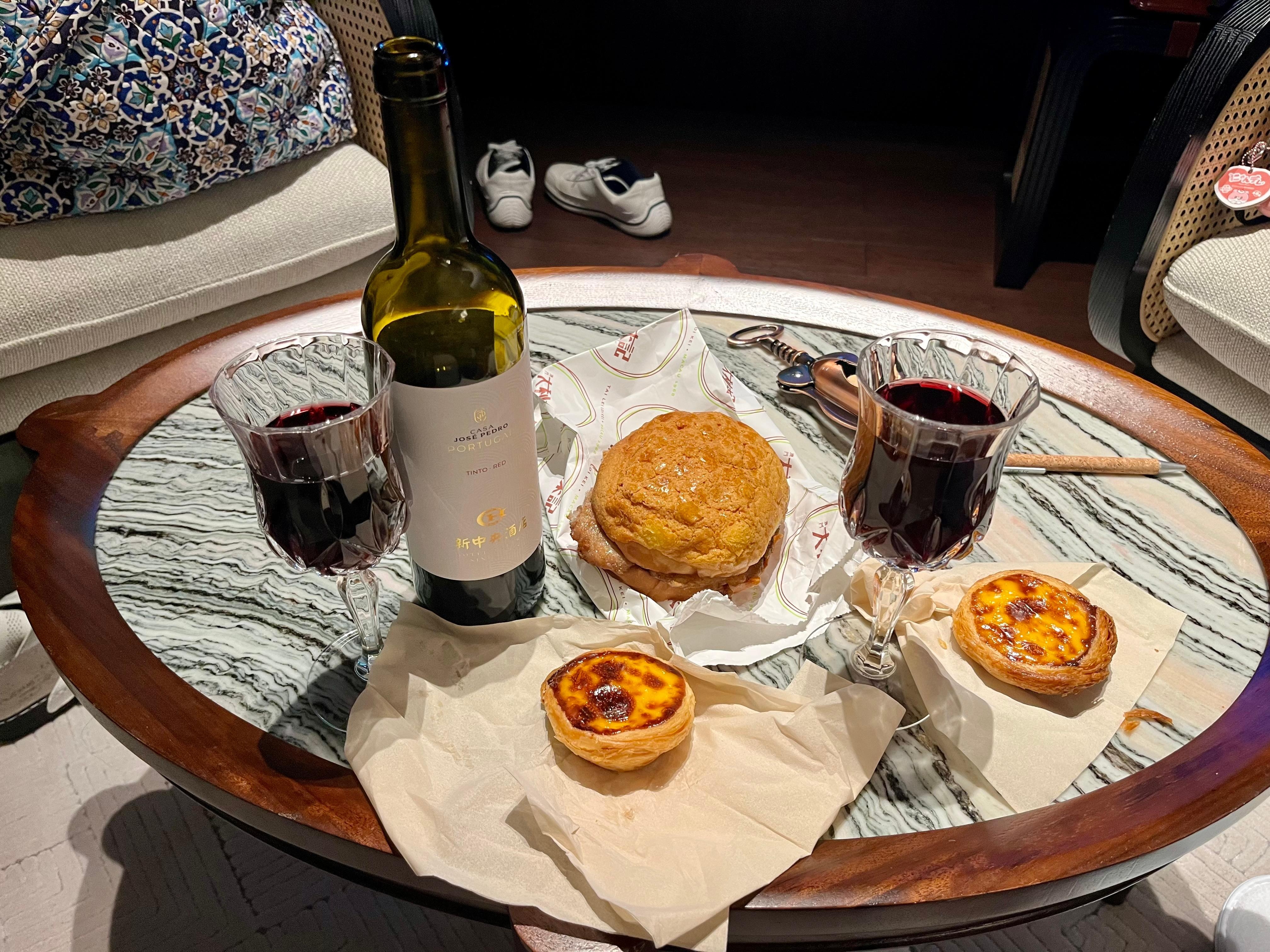 Free red wine pair with local famous egg tart