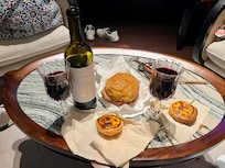 Free red wine pair with local famous egg tart