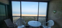 The translucent windows on the balcony that block the sea breeze