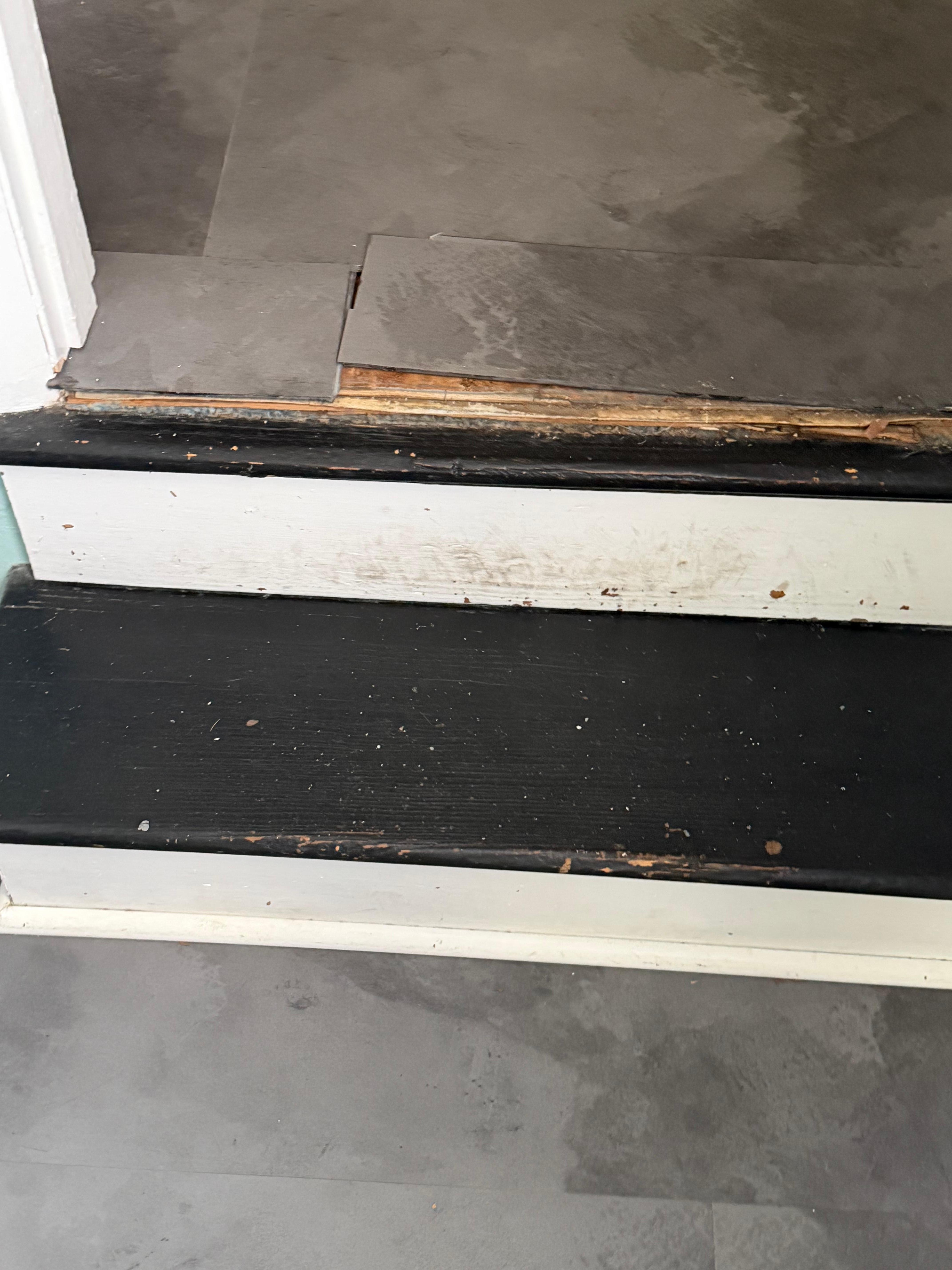 Tile coming up on the floor