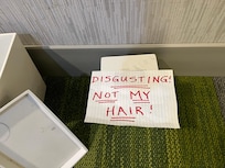 Someone else’s HAIR on plastic Kleenex box!