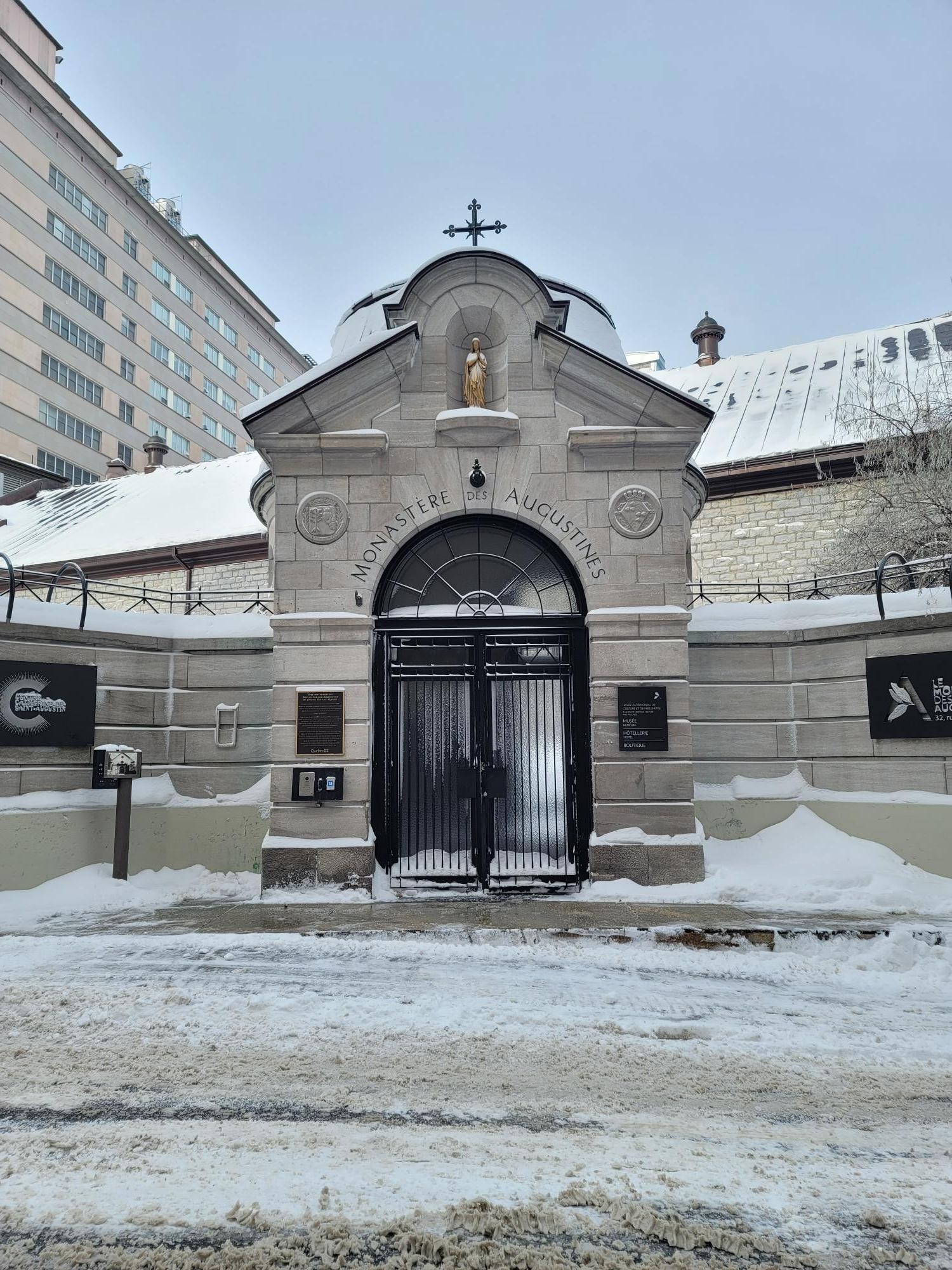 Street entrance for pedestrians; there is a separate entrance for those driving with a parking lot. There is an intercom to reception for after-hours arrivals, when the door is locked (opens with room key).