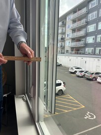 Can't really measure the opening as it is blocked to only open this far as there is also a screen on it further reducing air flow. Fumes from cars below come in.