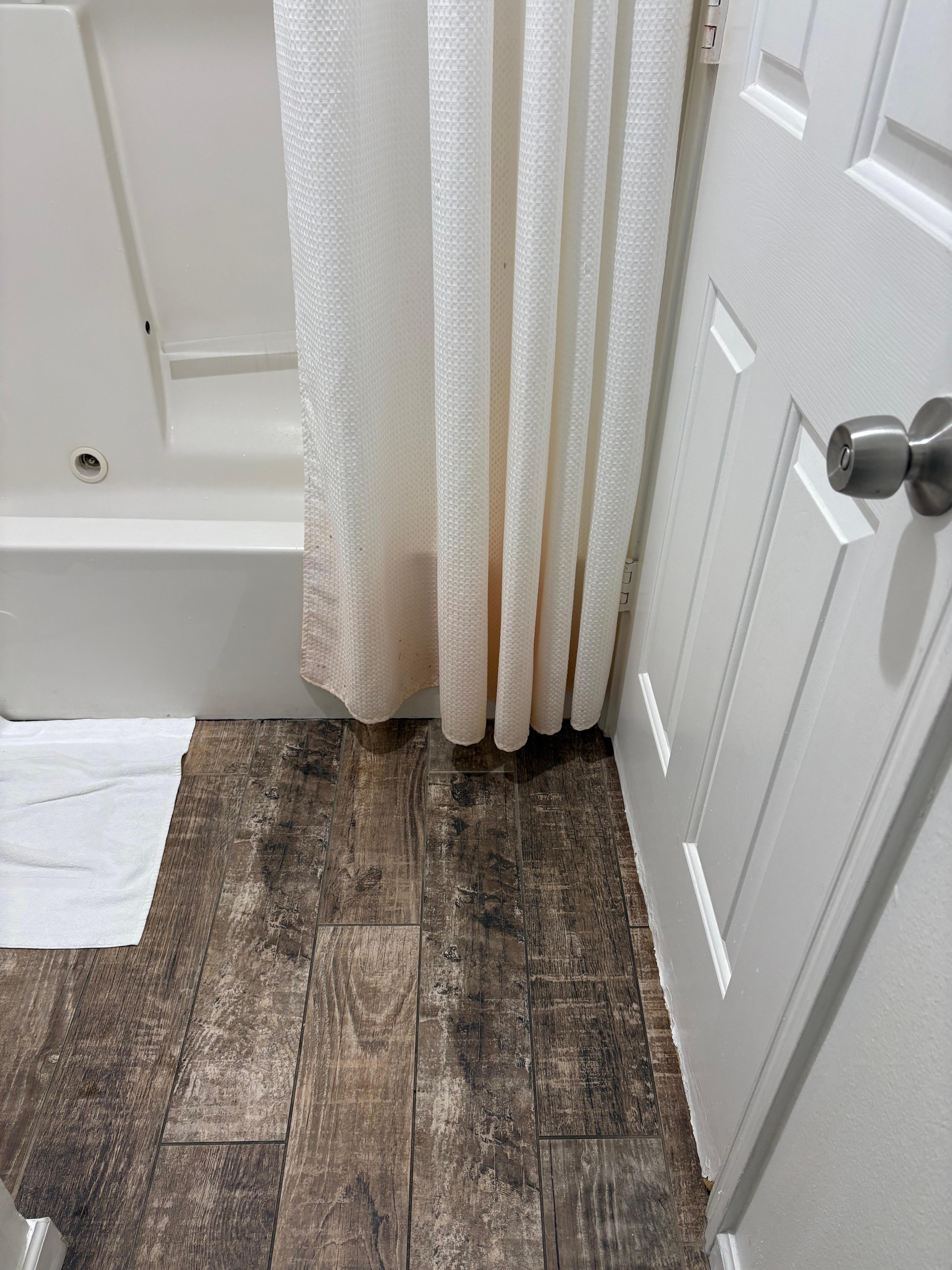 shower curtain is pink at bottom (hard to see in pic)