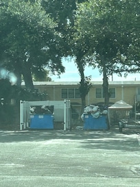 The dumpsters viewable from the parking lot