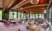So may inviting common spaces! This is the breakfast room/lounge. The lobby with terrace and the game room are also nice places to be.