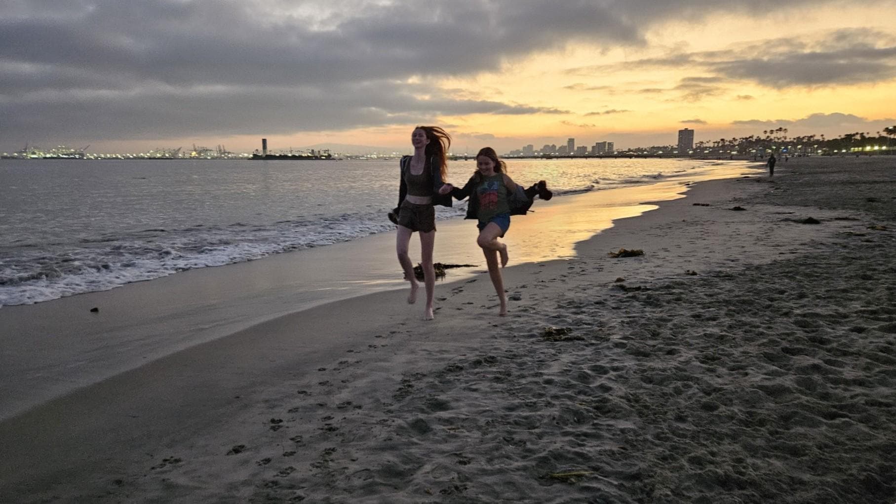 Our daughters at the beach down the street!  
