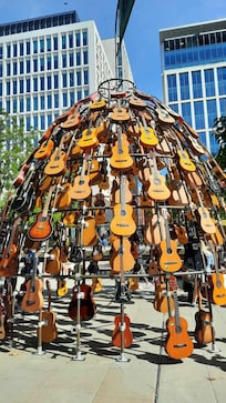 Sculpture of guitars outside of the Manchester Central Library.