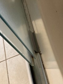 Mold inside glass shower doors