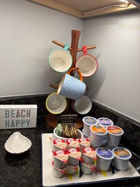 Adorable coffee bar! K cup AND a regular brew coffee pot!!
