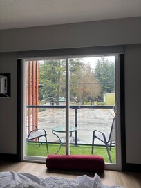 Balcony with table perfect for enjoying breakfast from café next door
