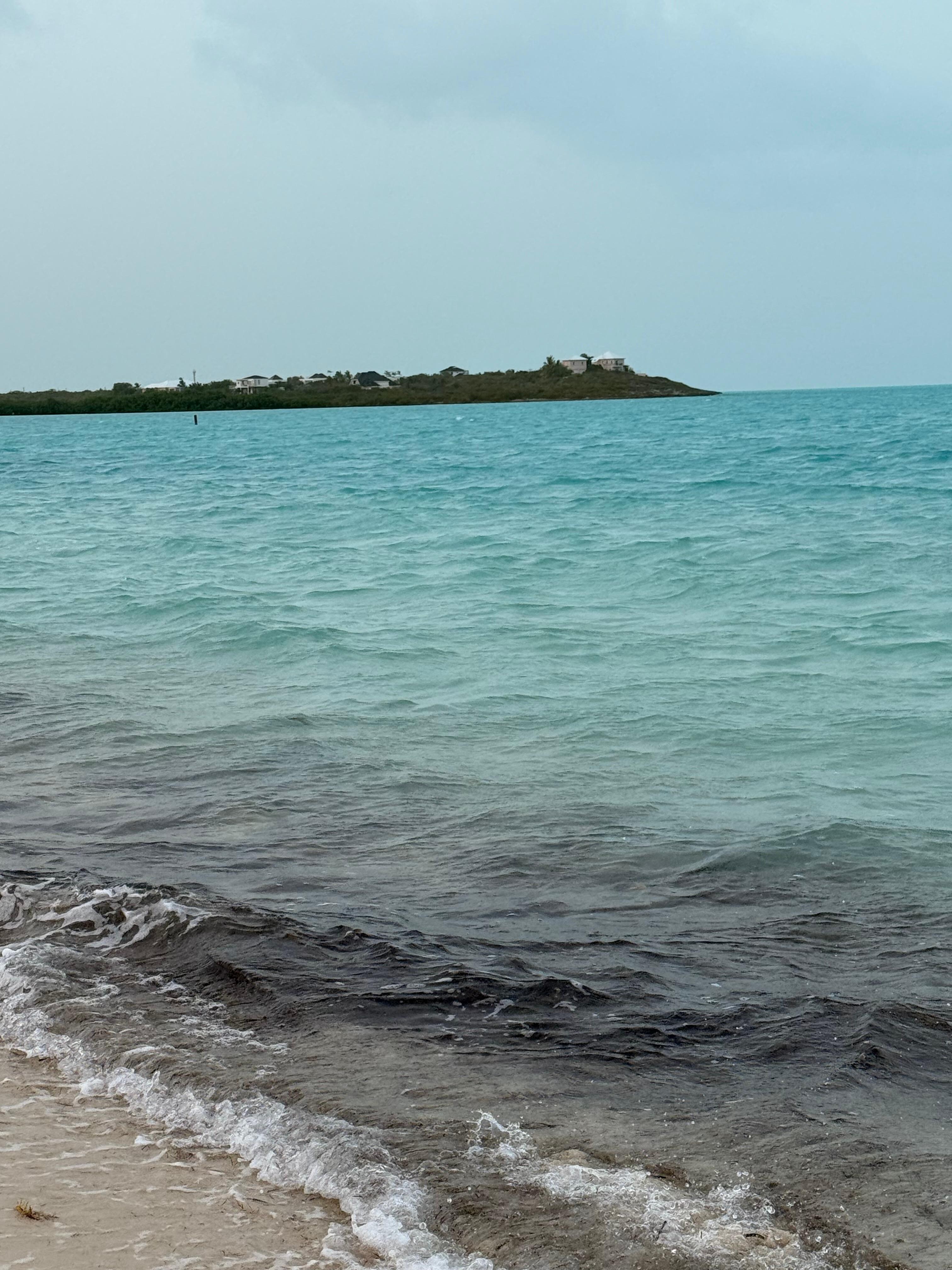The view of the house from long bay beach.