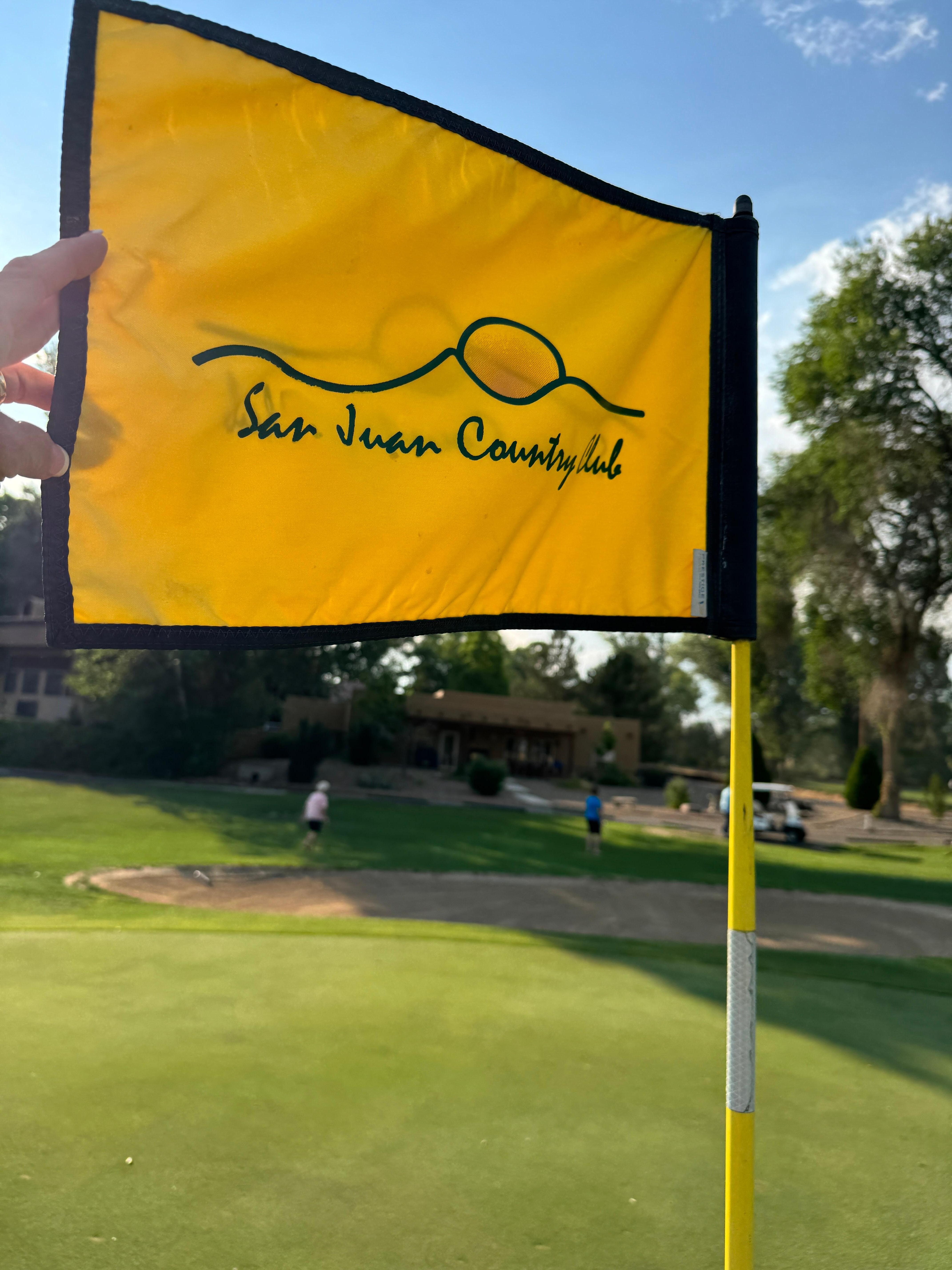 6th green with house in background 