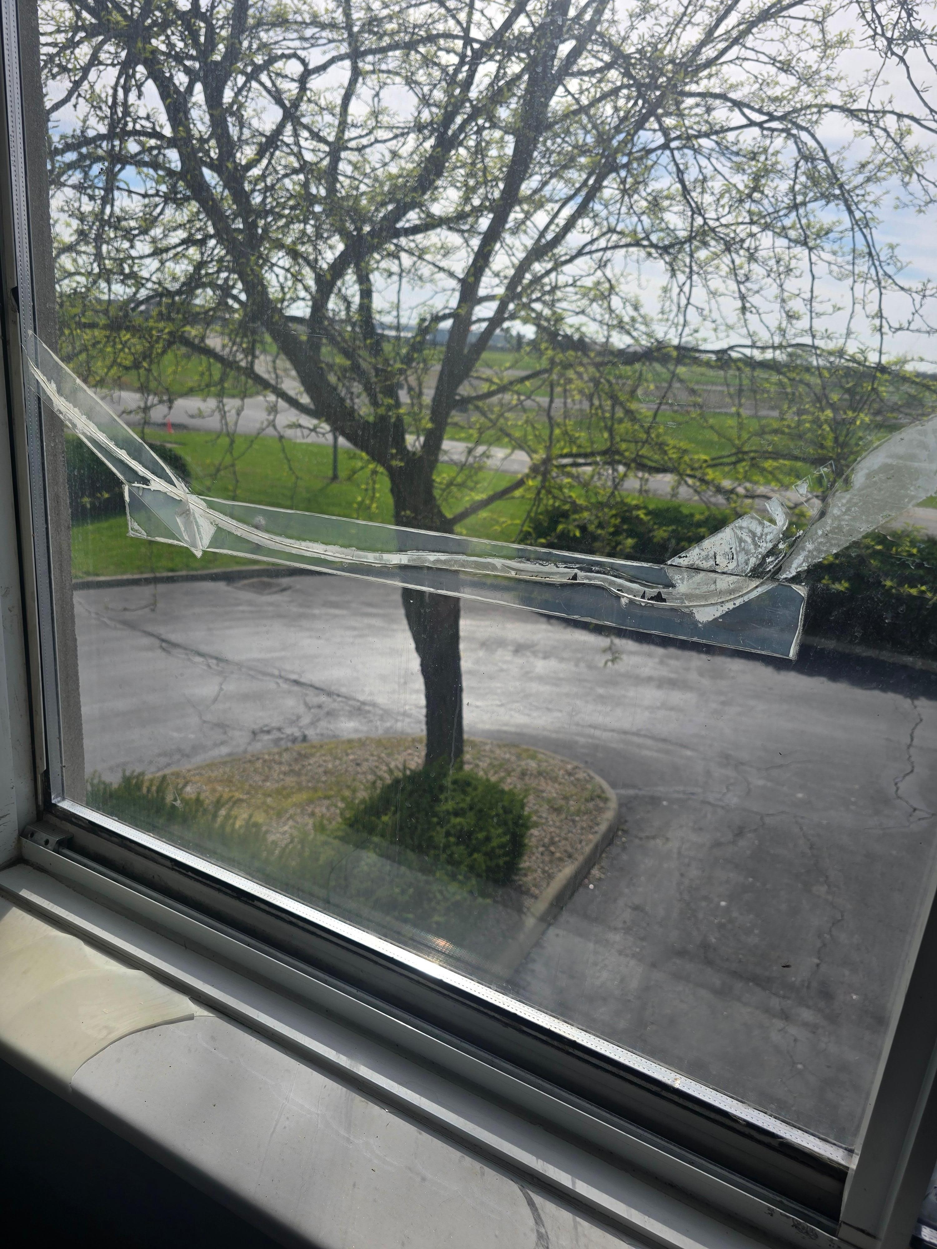 Broken and taped window eith mold