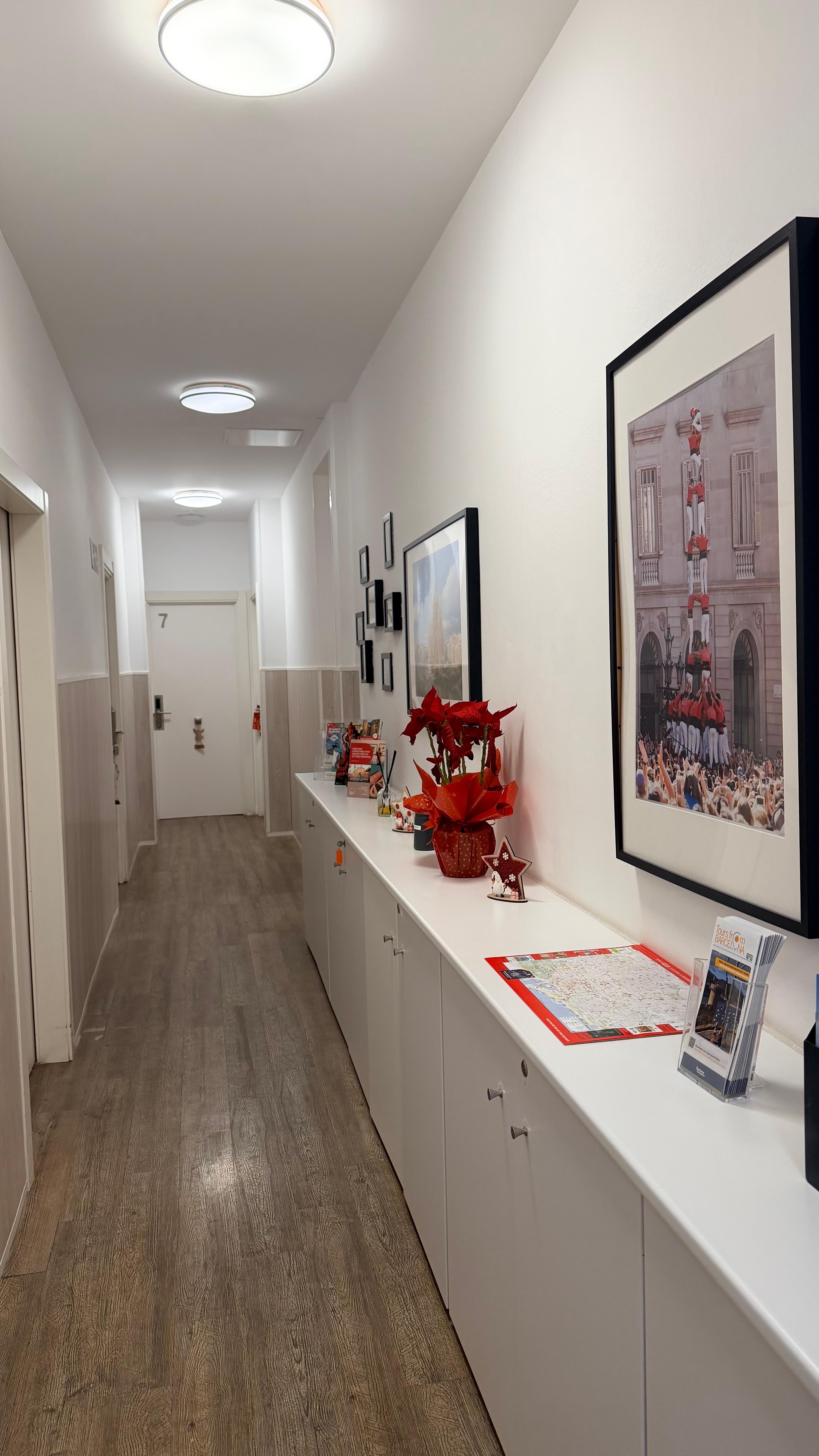 Hallway to room. Immaculate and pleasantly scented with reed diffusers.