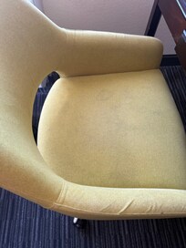 Mystery stains on the only cuck chair.