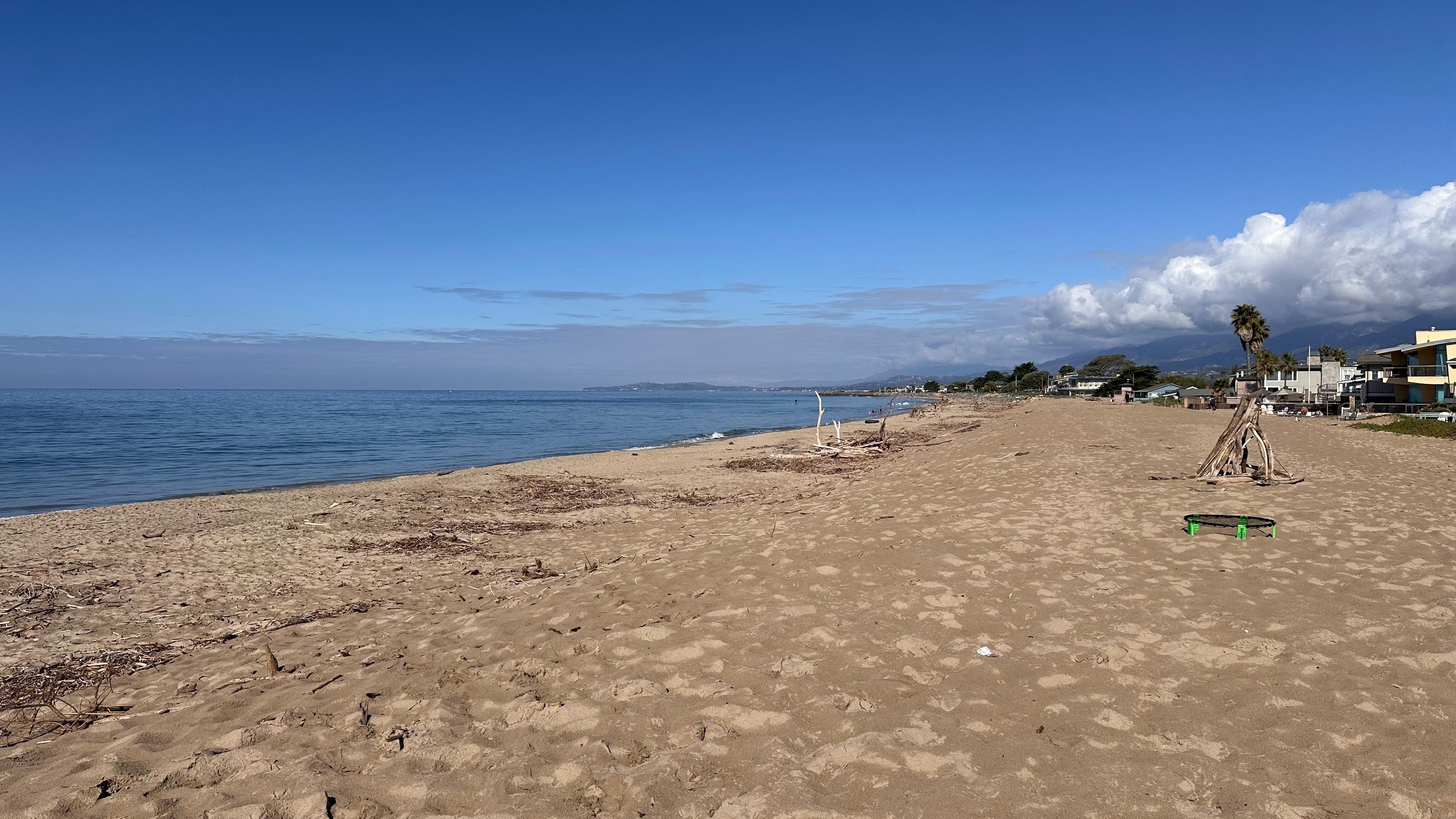 The city beach is flat and sandy.