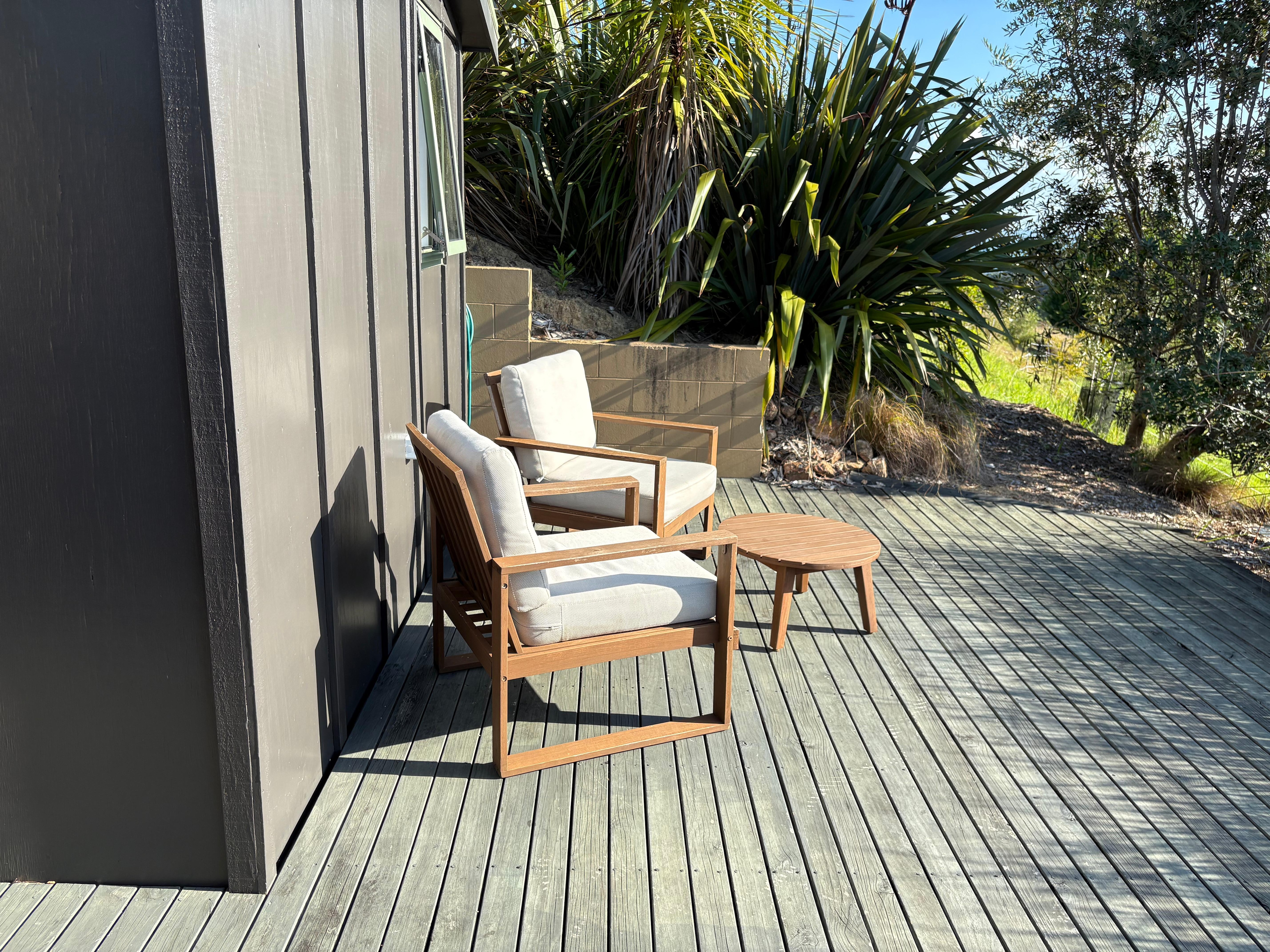 Deck area by yurt and bath building