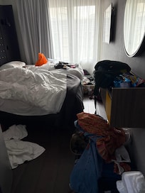 Our cozy room. No where to put luggage.